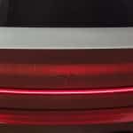 Snow coloured Polestar 2 dual motor EV with performance pack rear LED tail light