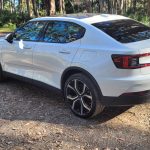 Snow coloured Polestar 2 dual motor EV with performance pack rear angle view