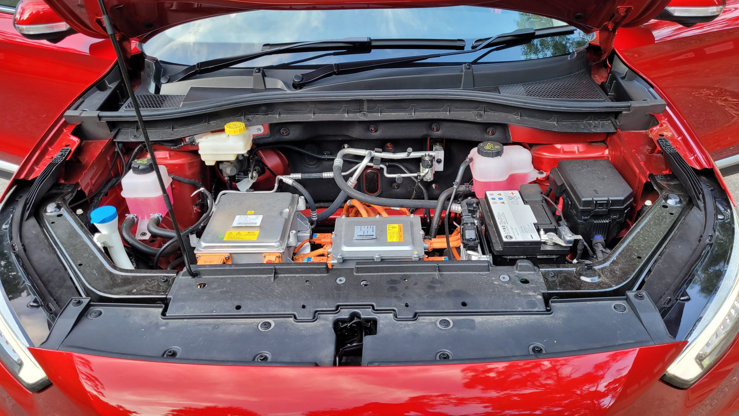 View of motor in open hood of MG ZS EV