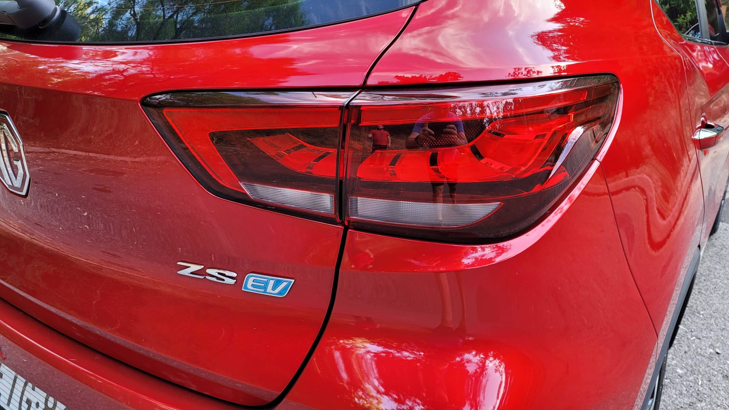 Close-up view of rear tail light on red MG ZS