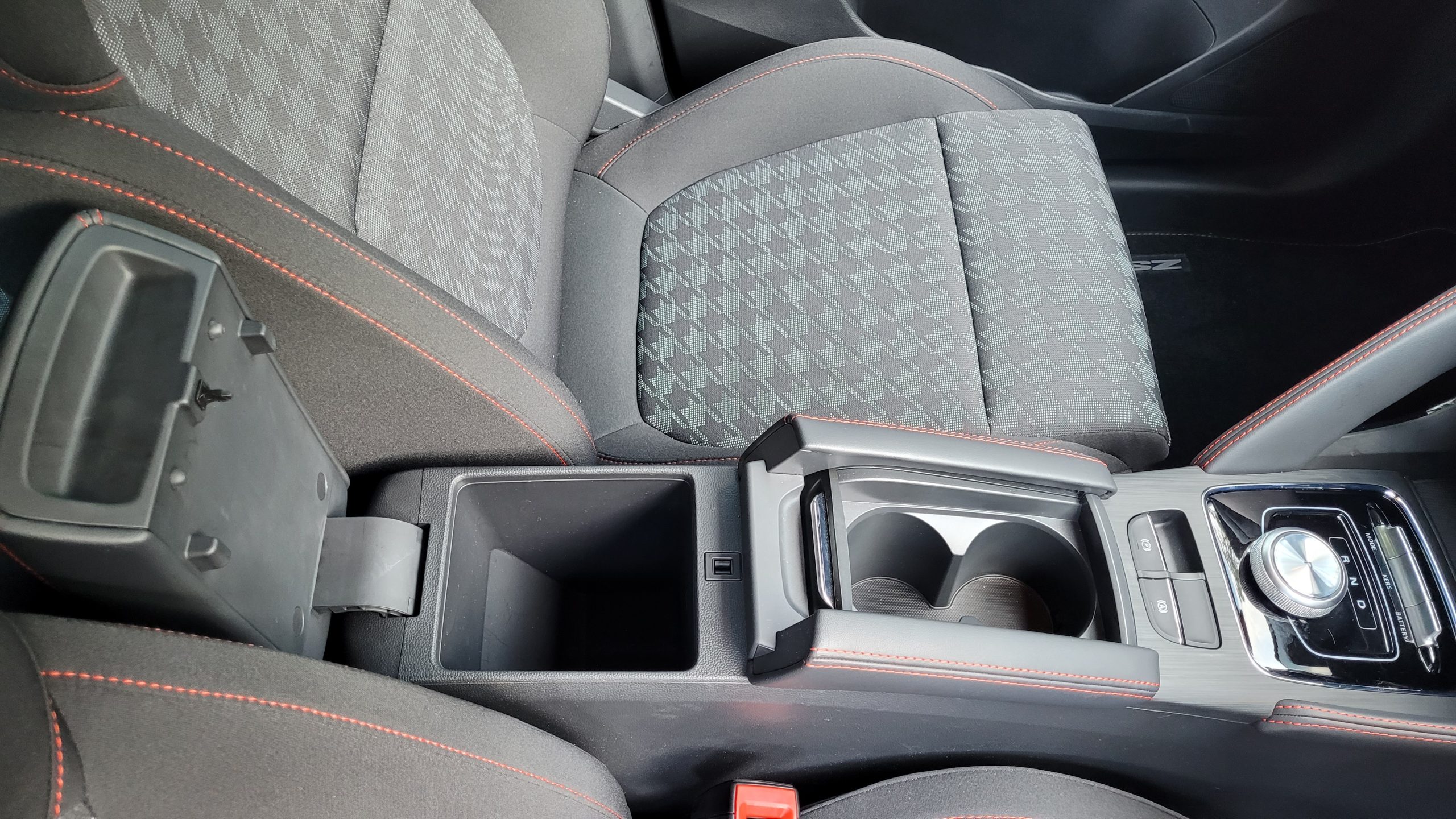 MG ZS EV view of centre console cup holders and storage