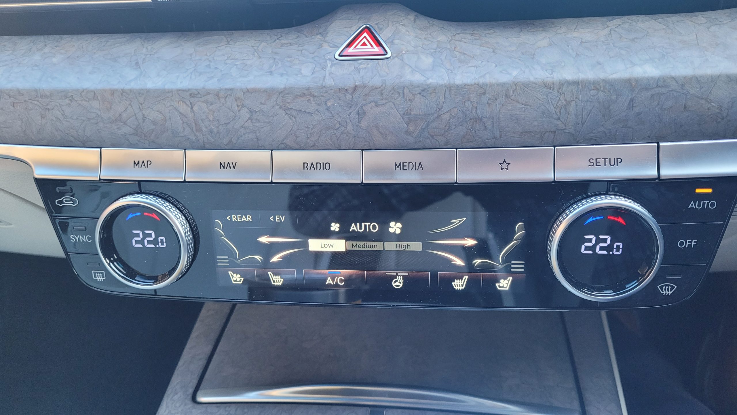 Close up view of Genesis electric G80 air conditioning unit controls