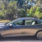 Makalu Matte Gray Genesis G80 electric vehicle left side profile