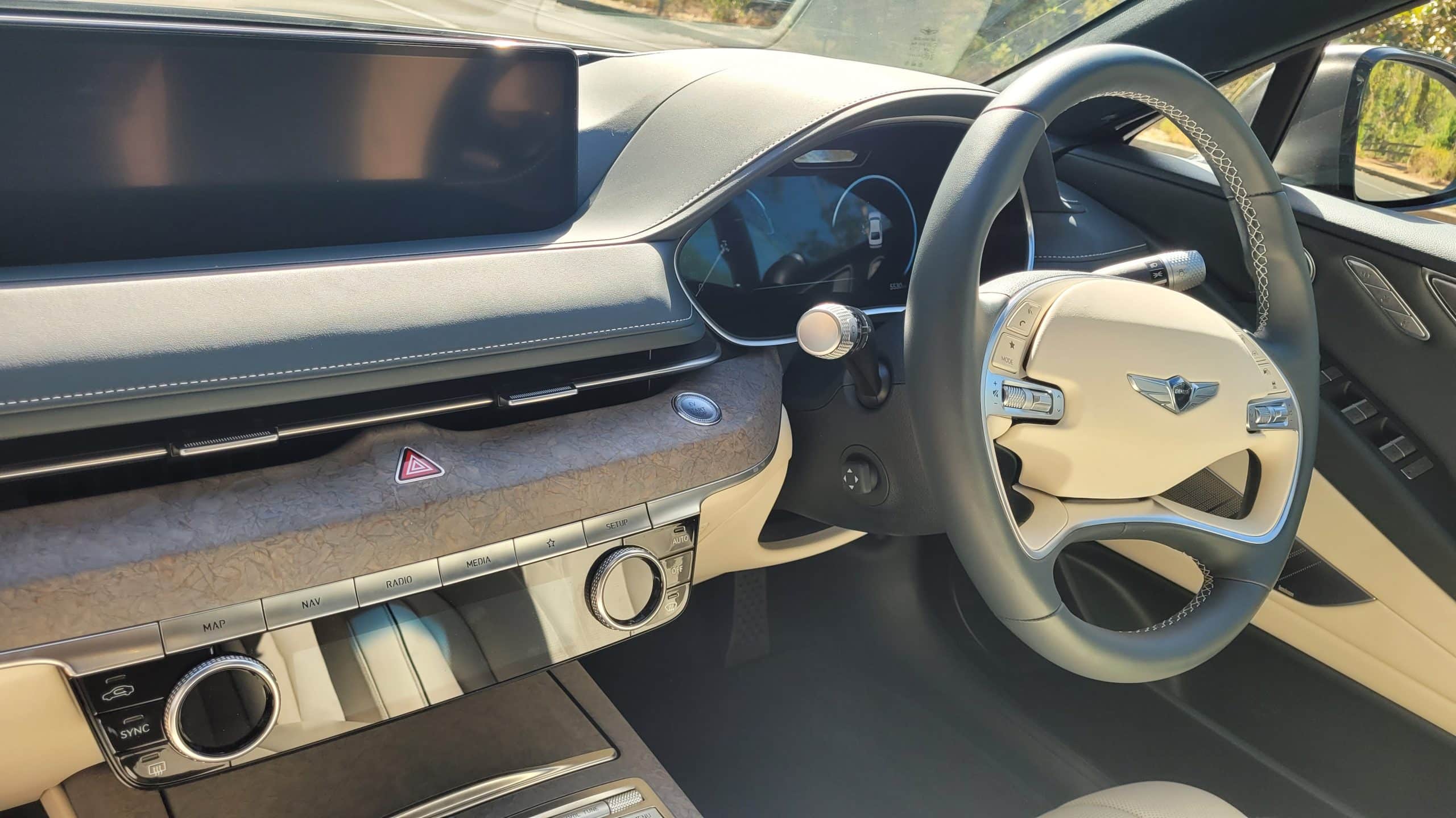 Genesis G80 electric vehicle front dash in day time