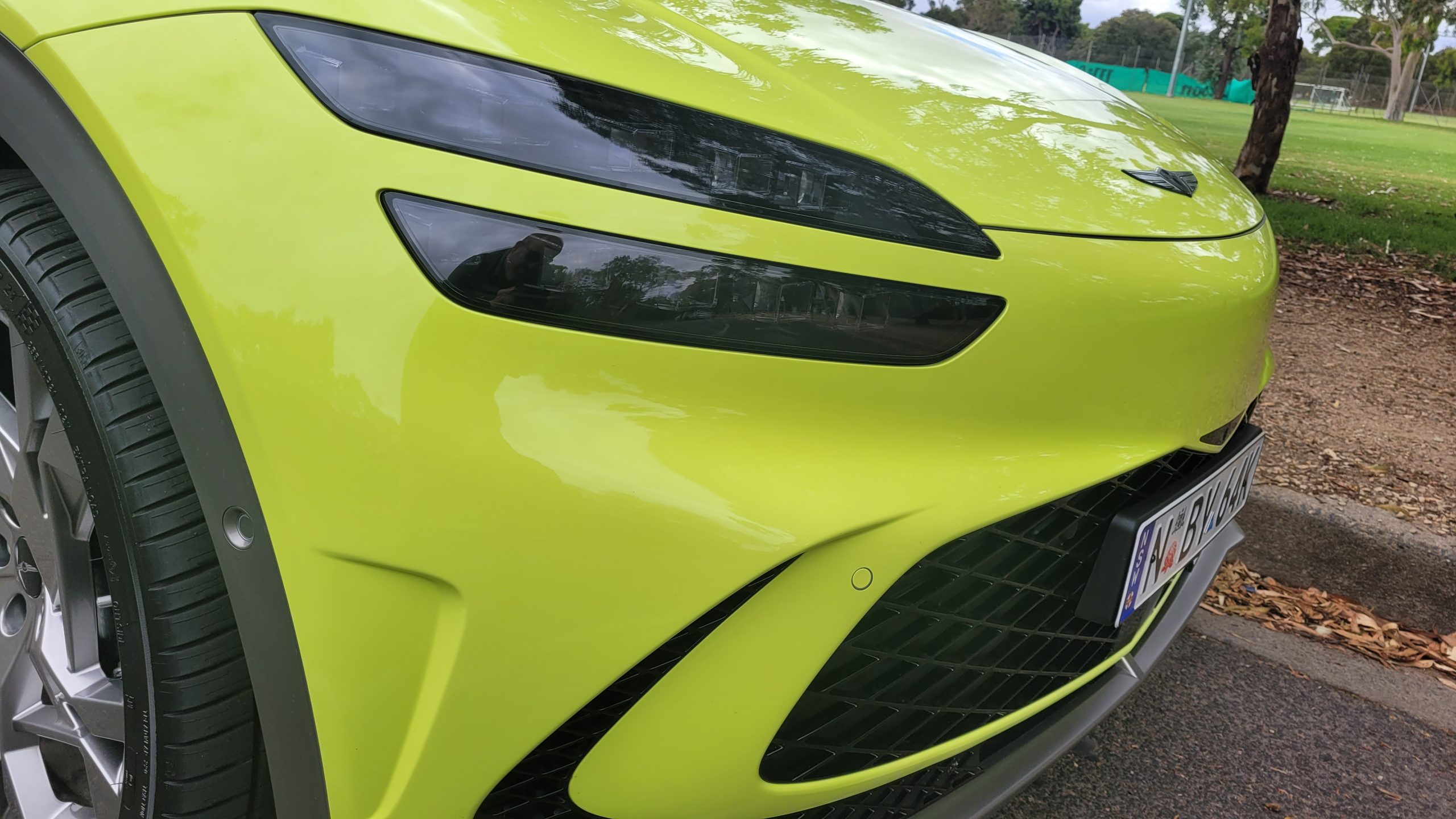 Sao Paulo Lime green Genesis GV60 front fender and close up of LED headlights