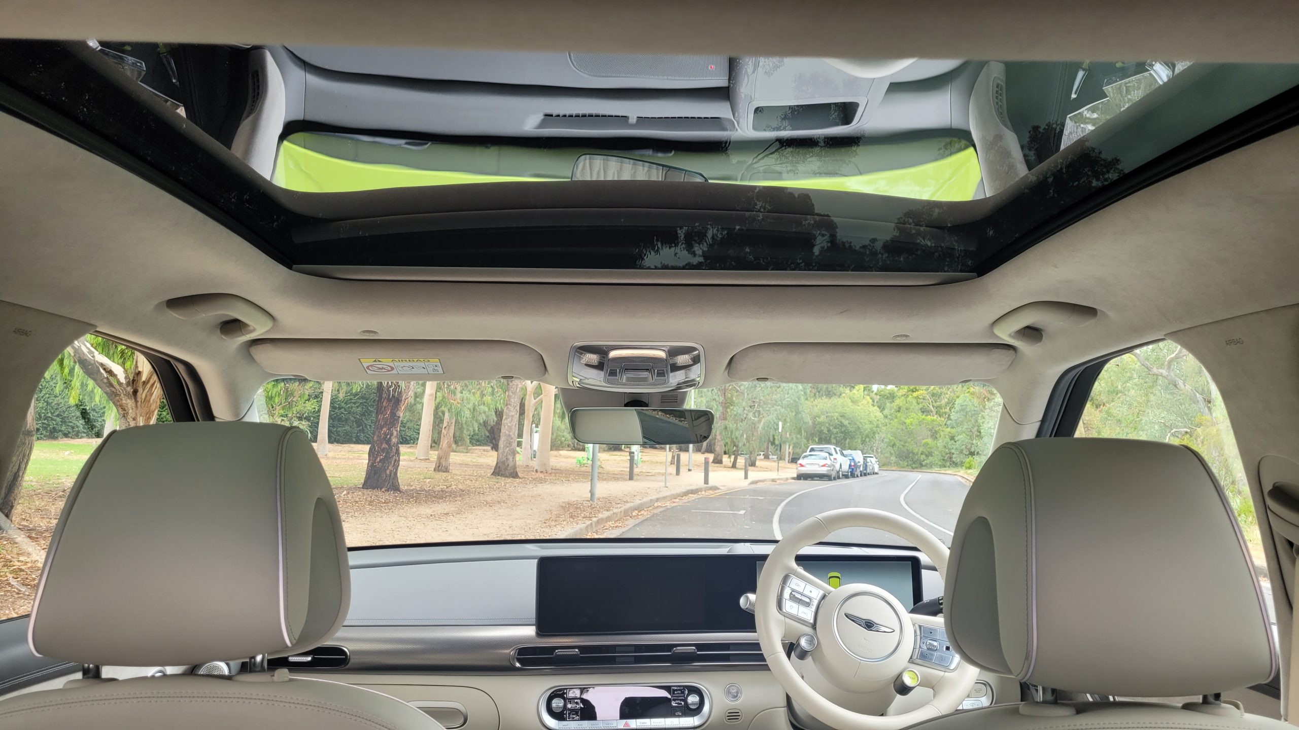 Interior view showing moon roof open and looking out the front windscreen of the GV60