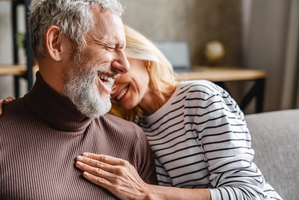 Health Insurance Banner - A senior couple laughing together