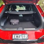 Red Kia EV6 GT-Line exterior rear view with boot open