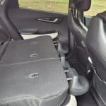 Red Kia EV6 GT-Line back seat view with rear seats folded down