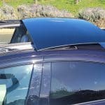 Black Hyundai IONIQ 6 TECHNIQ with open sunroof