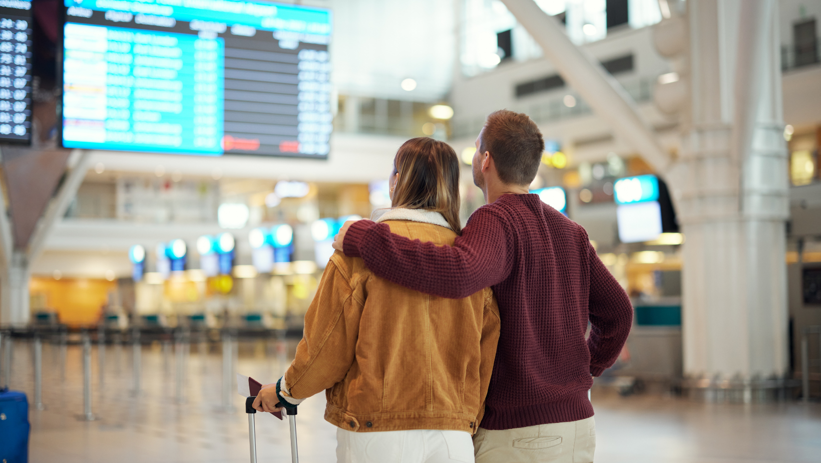 Couple standing in an Aussie airport