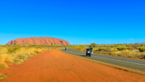 Motorcycle road trippers near Uluru in central Australia